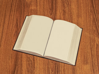 Blank Hardcover Book On Wooden Table