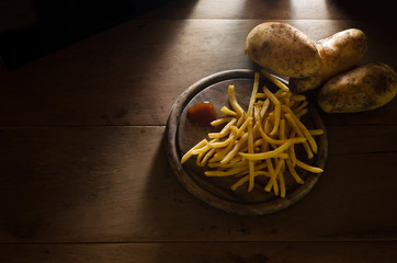 Fried potatoes dark tone