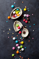 Fototapeta na wymiar Colorful candies and chocolate egg