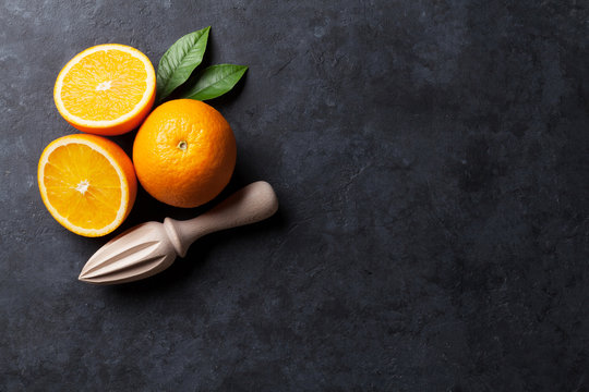 Oranges and juicer © karandaev