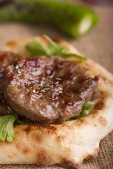 Delicious Turkish Traditional Kebab Kofte with pilaf on white plate (meatballs)