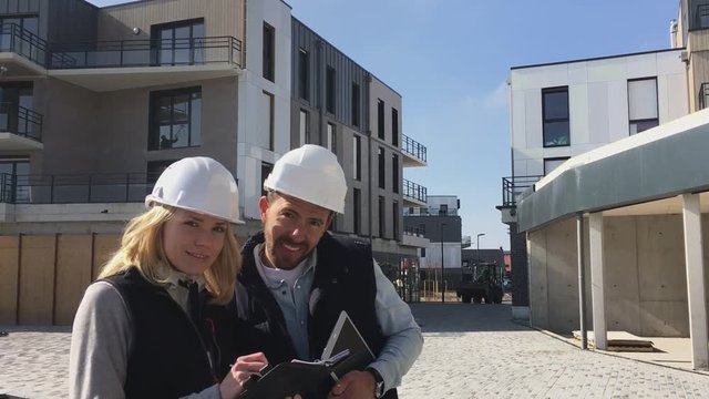 View of a Worker and enginner checking last details before delivery