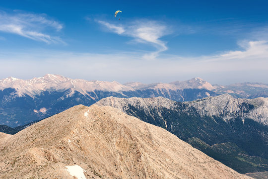 Flying paraglider in the sky on Turkey mountains