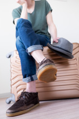 Sitting on baggage