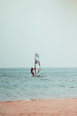 Wind surfing photo toned in vintage style