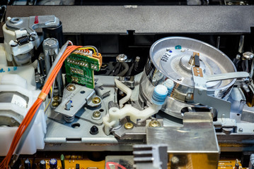 VCR tape transport mechanism close-up shot