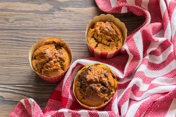 Homemade sweet muffins with strawberries and chocolate