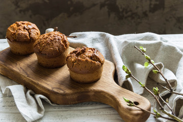 Homemade sweet muffins with strawberries and chocolate