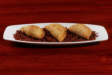 Sausage on a skewer in a corn dough deep fried, homemade corn dogs