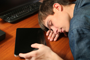 Man sleep with Tablet