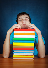 Tired Student with a Books