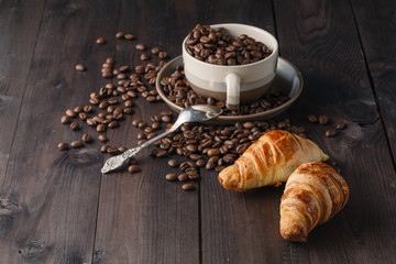 Fresh coffee beans on wood