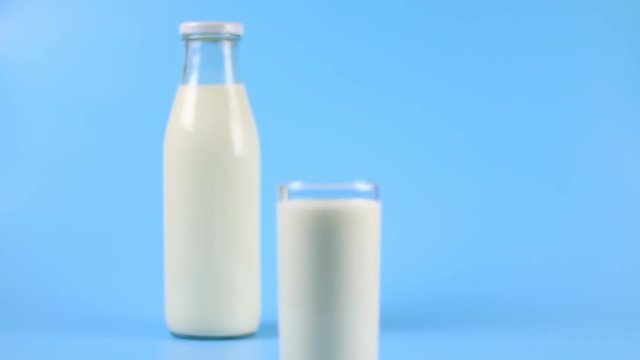 Milk pouring into glass