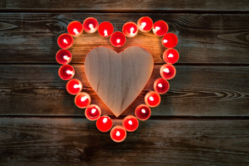 Heart of burning candles