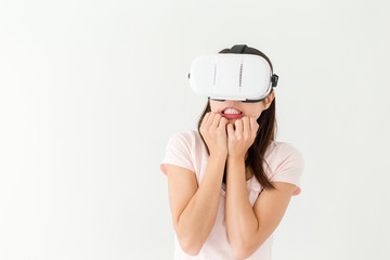 Woman watch scary movie via VR device