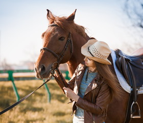 Fototapeta premium Woman and horse. Portrait close up