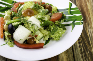 Salad with cabbage, tomatoes and pepper.