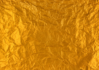 Naklejka na ściany i meble gold crumpled foil.