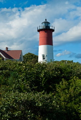 Fototapeta na wymiar Candy Cane Striped Nauset Lighthouse on Cape Cod Summer Day