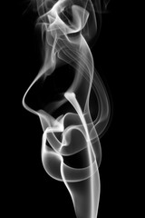 Smoke abstract, isolated on black background.