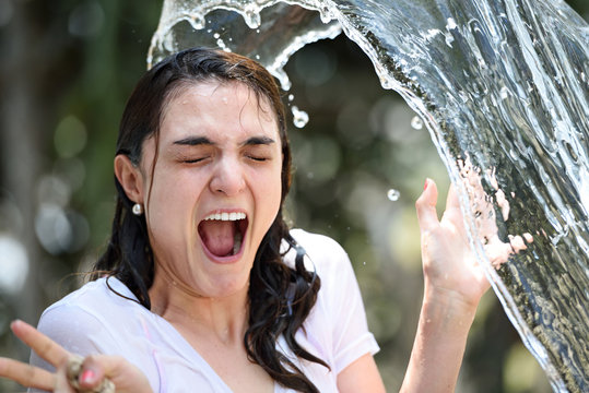 water splash on girl face