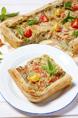 Pie with cheese, tomatoes, herbs and spices