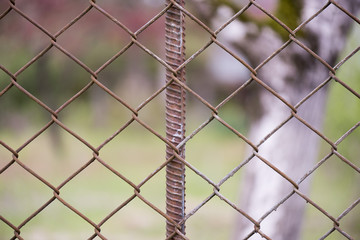Fototapeta premium rusty metal grid on a black background