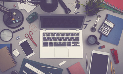 Messy top view office desk