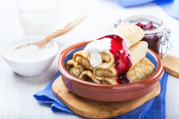 Crepes rolls with  with with cottage cheese filling