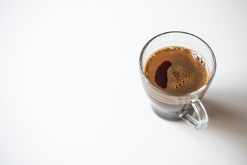 A Cup of Coffee isolated on a wite background, top view