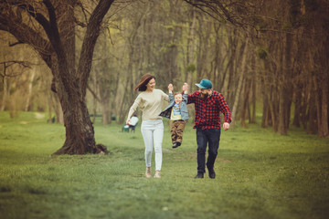 Fototapeta premium Happy family in the park