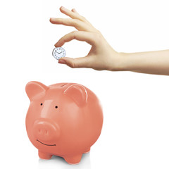 Piggy bank and a hand holding timer above it on white background 
