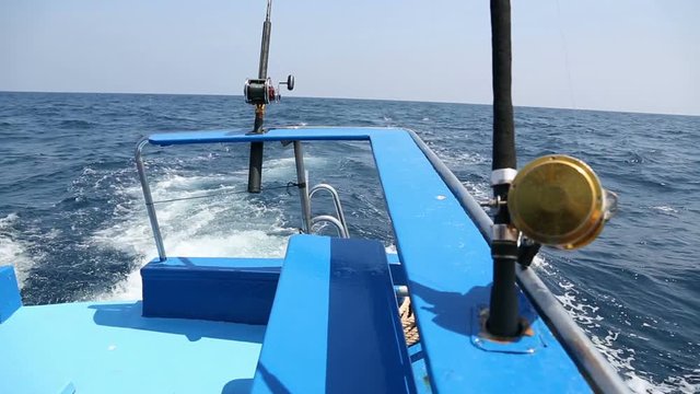 Trolling - fishing from a boat on the sea