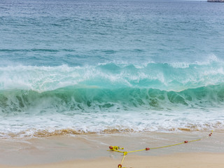View of Waves at Sandy Beach of Cabo San Lucas in Mexico