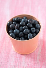 blueberry on wooden surface