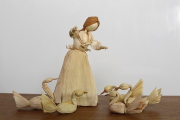 Shepherdess and geese (made from corn husks). Easter decoration.