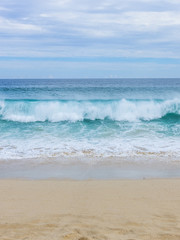 View of Waves at Sandy Beach of Cabo San Lucas in Mexico