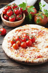 Italian pizza margherita with tomato and mozzarella