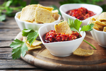 Hot mexican salsa with chili peppers