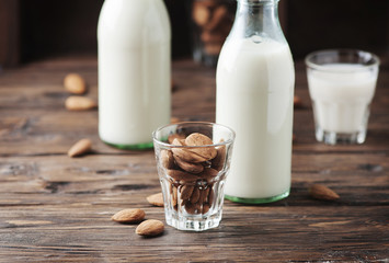 Almond milk on the wooden table