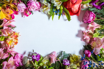 Stylish branding mockup to display your artworks. light wood with flowers and blank letter. Cute vintage mock up on wooden background.