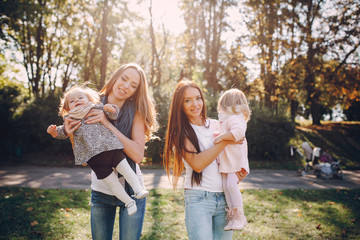 young family walking in the park