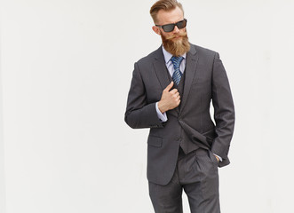 model in suit and sunglasses