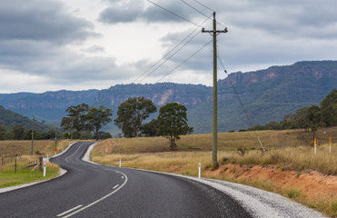Scenic winding rural road in Wollemi National Park, New South Wales, Australia