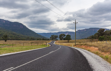 Scenic winding rural road in Wollemi National Park, New South Wales, Australia