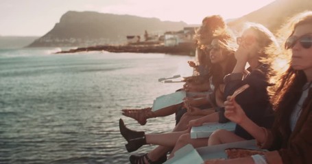 Hipster style teenager friends eating pizza on the dock - Powered by Adobe