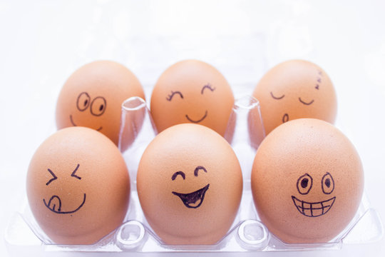 funny eggs with painted face