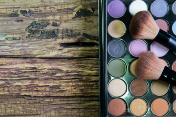 Set of professional brushes for a make-up of eyes, a palette of