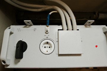 Close up view of electrical panel with fuses and contactors.