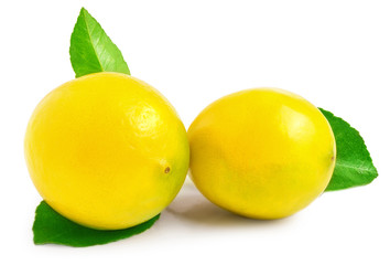 Lemons with leaves on a white background